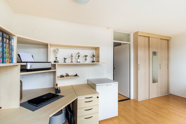 Foto - Te koop: tussenwoning gelegen aan groenvoorziening